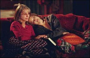 Daphne (Diane Keaton), left, cuddles with her youngest
daughter, Milly (Mandy Moore), in Because I Said So.