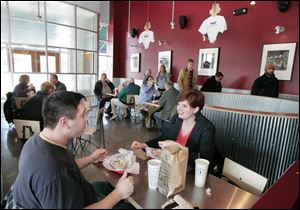 Dave and Kari Dilworth, of Sylvania, join the lunch crowd at Chipotle on West Central Avenue in Toledo. 