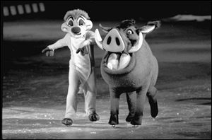 Timon the meerkat, left, and Pumbaa the warthog from The Lion King hit the ice.
