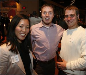 Tanya Pipatjarasgit, left, Kris Keating, and CJ Murawski at the EPIC Toledo reception.
