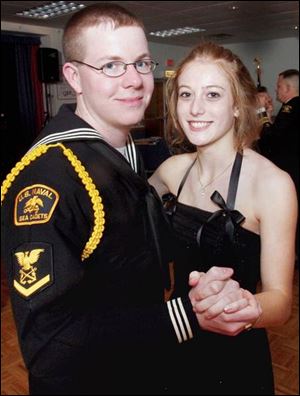 Cadet Bryan Haynes and Casey at the U.S. Naval Sea Cadet Corps formal ball at the Conn-Weisenberger American Legion hall.