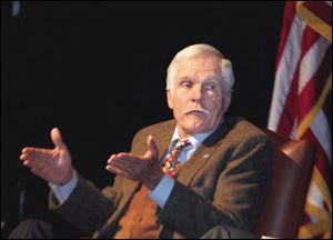 Ted Turner responds to questions from the audience at the Rotary Club event at SeaGate Centre.
