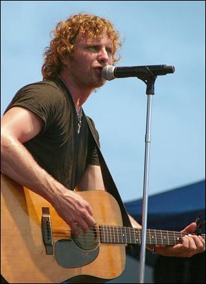 Dierks Bentley will perform tonight in the SeaGate Convention
Centre   minus his famous and much-loved curls.

