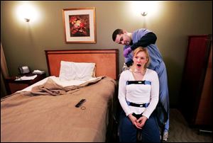 Electrodes are fitted to a patient at a sleep-study clinic operated by a St. Paul, Minn., hospital.