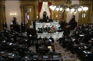 Gov. Ted Strickland addresses members of the General Assembly in the Ohio House chamber.
