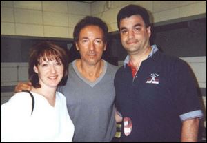 Karin and Jim Steel with Bruce Springsteen, center. Steel once was program director for WIOT-FM in Toledo.