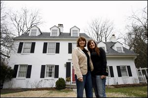 Debbie Witherell, left, and her daughter, Hayley, live in the Ottawa Hills Blandings replica now.