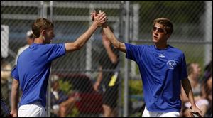 The Generals' Matt Kuck, left, and Andrew Hohl congratulate each other after winning the No. 1 doubles title.