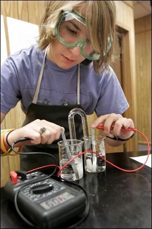 Amanda Howard, 17, does lab work in an advanced-placement chemistry class at Southview High School.