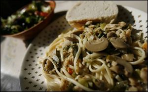 Clam linguine with warm, crusty bread and a tossed salad.