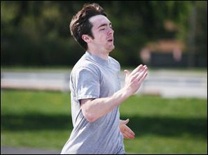 Toledo Christian senior Andrew Bosserman works out at practice. Bosserman competes in sprints and relays.