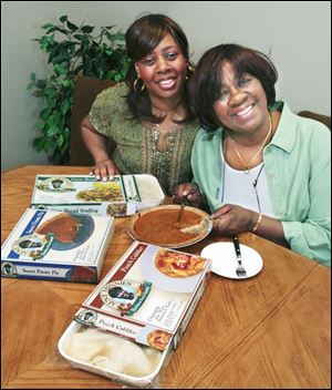 Claudia Sebree-Brown, left, and Minnie Sebree with some of their wares.