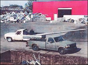 A surveillance video from R&M Recycling Inc. shows a pickup truck with the missing pole.