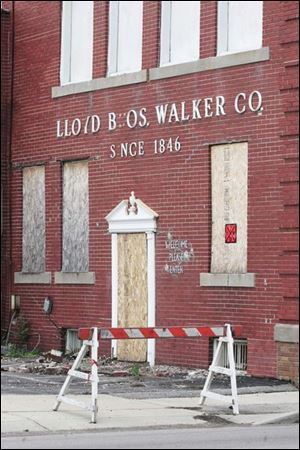 The former Lloyd Bros. Walker Co. headquarters in West Toledo will be razed.