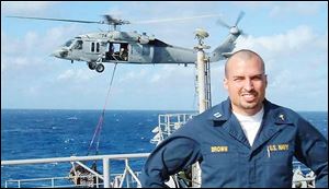 Lt. Dale Brown, an ordained minister and U.S. Navy chaplain from Columbus, is serving
in the Persian Gulf.