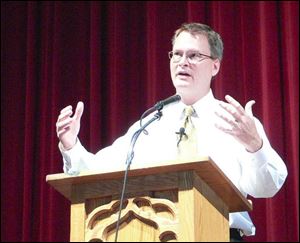 The Rev. Adam Hamilton, pastor of Church of the Resurrection United Methodist Church in Kansas City, a fastgrowing
church in the denomination, speaks to the UMC annual convention at Lakeside, Ohio.
