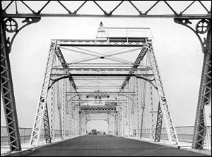 The Fassett Street Bridge, shown in 1938, was badly damaged and later razed after a freighter struck it in 1957. 
