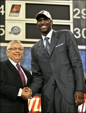 Greg Oden shakes hands with NBA commissioner David Stern after being taken with the draft's first pick. Memphis used the No. 4 pick for Ohio State's Michael Conley.