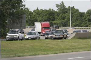 Traffic on I-75 south is stymied at Wales Road yesterday. The AAA figures 41.1 million Americans have holiday travel plans.