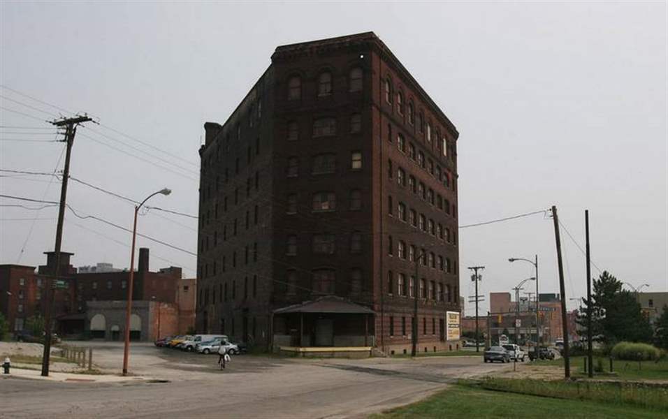 Lansing-men-pay-575-000-for-Erie-St-Triangle-Building