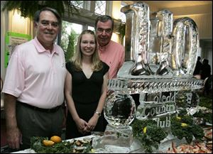 Reg Jackson, left, Kate Buckley and her dad, Bill Buckley are among the guests to reminisce about days gone by and the days yet to be as the Toledo Country Club celebrates its 110th birthday.