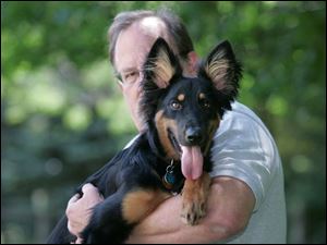 Rudi's uncertain parentage may soon be revealed from a DNA test that's becoming popular with pet owners who want to learn more about their animals. Mike Bartell got Rudi from a pet adoption agency.