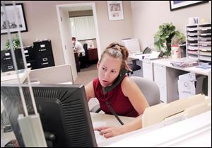 Melissa Goyette, and about 1,200 of her co-workers lost their jobs with Mortgage Lenders earlier this year. She now works in a lower-paying job with Bond Financial Services in Longmeadow, Mass.