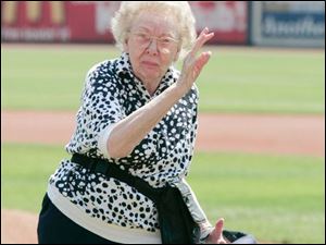 SPT hens01p 07/31/07 The Blade/Dave Zapotosky Location: Toledo, Ohio Caption: Ella Grace Scott, 89, a resident of West Park Place senior living community in Toledo had the honor of throwing out the ceremonial first pitch before the start of the Mud Hens game against Richmond Tuesday afternoon. She said she is a long time baseball fan who saw games at old Swayne Field. (There were a number of senior citizens in attendance Tuesday although there is apparently no official name for the promotion.) Summary: Toledo Mud Hens vs Richmond Braves baseball at Fifth Third Field. The Hens beat the Braves 8-4.