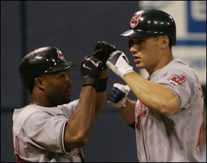 Grady Sizemore is greeted by Josh Barfield after smacking a two-run homer in the third inning for the Indians.