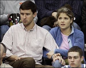 Jenna Bush watches the ACC men's championship basketball game between Georgia Tech and Duke on March 13, 2005, in Washington with long-time boyfriend, Henry Hager, now her fiance.