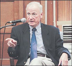 Mayor Carty Finkbeiner says the city's department of neighborhoods decides when a property is to be razed. 
