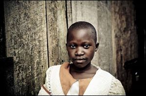 Babirye, a Ugandan child whose father died of AIDS, is one of four youths whose voices serve as tour guides.