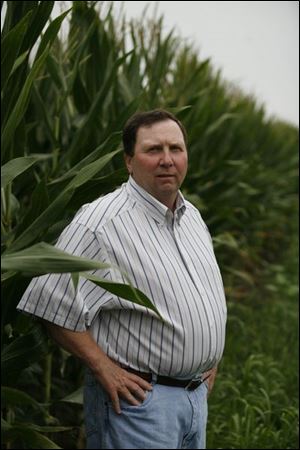 Jerry Tedrow will get $167,000 for 117 acres of his farm near Delta, but he's sure his land will stay farmland forever.