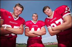 Bedford hopes to improve on a 4-5 season with key returing players (from left) Tyler Gill, Joe Copciac and Matt Drew.
