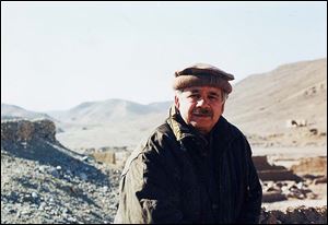 Dr. Hussain pauses during a trip to Afghanistan, after which he wrote a series on the shadowy Taliban, whom he had interviewed in their native language. It was published in The Blade in 2001.