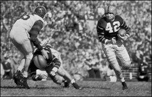 Dick Kazmaier carries the ball for Princeton in 1951.