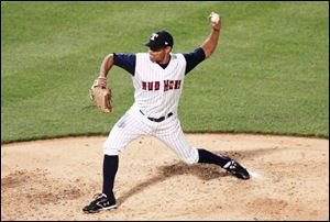 Pitcher Vic Darensbourg helped get the Mud Hens out of a 7th-inning jam, leaving two Indianapolis runners in scoring position.