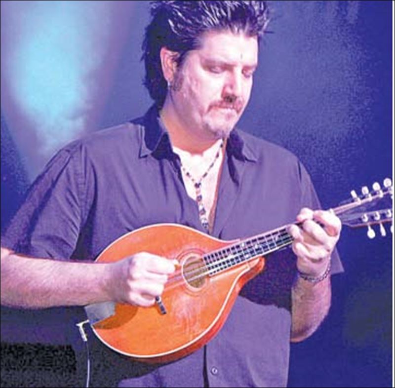 http://www.toledoblade.com/image/2007/09/05/800x_b1_cCM_z/Zen-and-the-art-of-rock-and-roll-Counting-Crows-guitarist-wears-many-musical-hats-2.jpg