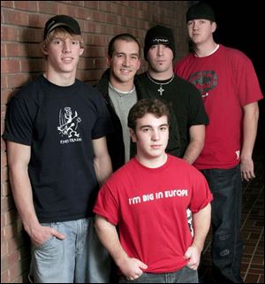 cty roosford15p 1 December 14, 2004. Members of the Christian rock band Pawn in front Tim Strausbaugh, back left to right Kyle Kleeberger, Travis Montgomery, Mark Montgomery, and Rob Golden. Blade photo by Jeremy Wadsworth