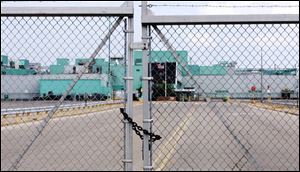 The gate is locked at the entrance to the General Motors Corp.'s Powertrain Plant on Alexis Road in Toledo. 