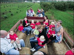 The climax of the day's activities: Erie Orchard hay ride, complete with bales to sit on.