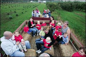The climax of the day's activities: Erie Orchard hay ride, complete with bales to sit on.