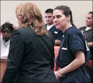 After making a tearful statement in court, Jessica Botzko, right, receives her sentence alongside attorney Ann Baronas.