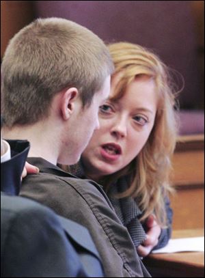 Robert Jobe and his attorney, Ann Baronas, confer during a hearing in Common Pleas Court. The defense team has said all along that young Jobe can- not get a fair trial in Lucas County. Other arguments yesterday included a debate on whether the teen's past encounters with police can be admitted into evidence. Jury selection is set to begin Oct. 29.