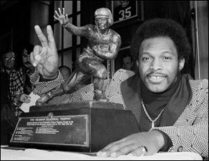 Archie Griffin emphasizes he has won two Heismans in this photo of the Buckeye running back after the 1975 season.