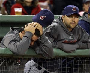 Indians David Dellucci, left, and Jake Westbrook have a tough time watching the developments in Game 6 of the ALCS against the Red Sox in Fenway Park - part of The Collapse.