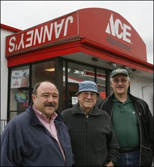 Tim Janney, left, with his father, Joe, and brother Doug, had hoped to move the hardware business.

