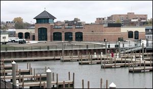 The marine passenger terminal along Front Street on the east side is adjacent to Toledo s Glass City Municipal Marina.


