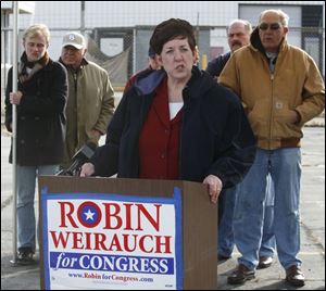 Congressional candidate Robin Weirauch speaks outside the closed TRW plant in Fremont.