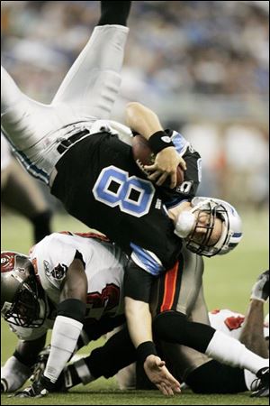 Jon Kitna, getting flipped against the Buccaneers in October, fell short of his goal to win 10 games. The Lions won seven.